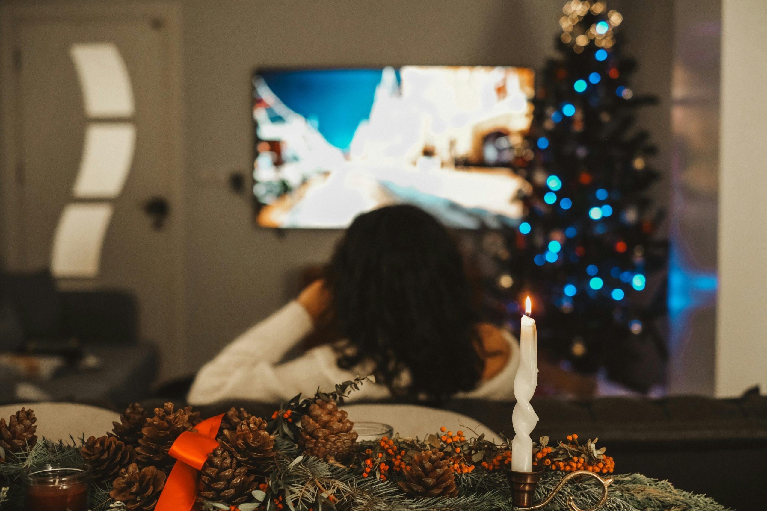 Person using a streaming device with a TV